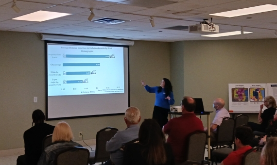 Photo of instructor giving presentation to group of people
